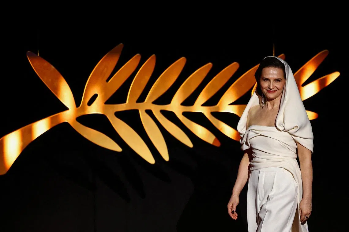Juliette Binoche, Jury President of the 78th Cannes Film Festival arrives on stage during the opening ceremony and the screening the film "Partir un jour" (Leave One Day) Out of competition at the 78th Cannes Film Festival in Cannes, France, May 13, 2025. REUTERS/Sarah Meyssonnier     TPX IMAGES OF THE DAY     