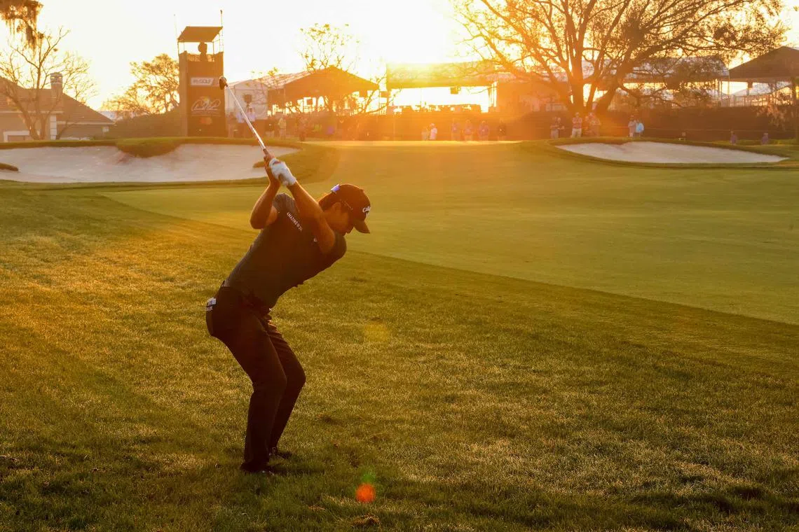 Min Woo Lee of Australia plays an approach shot on the tenth hole during the first round of the Arnold Palmer Invitational.