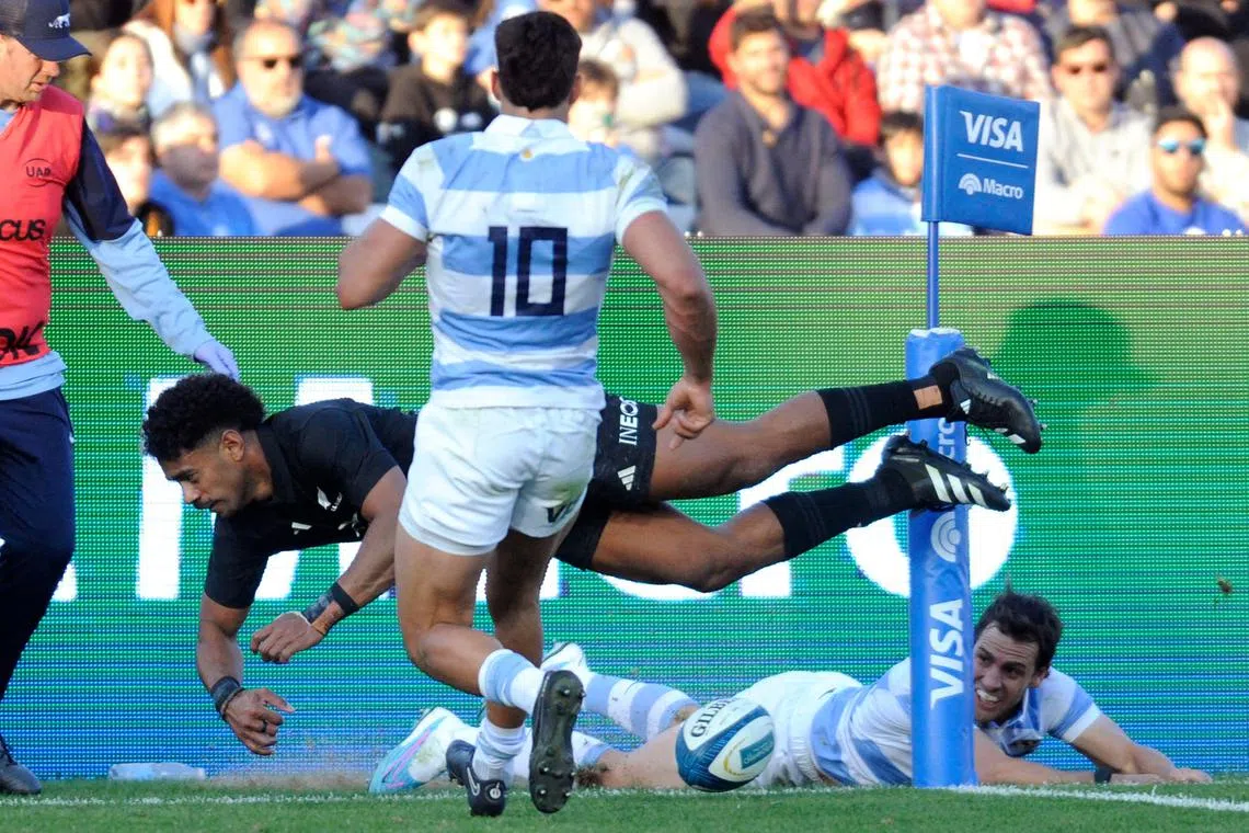 Debutant New Zealand winger Emoni Narawa scoring a try during the Rugby Championship 2023 first round match between Argentina's Los Pumas and New Zealand's All Blacks at the Malvinas Argentinas stadium in Mendoza, Argentina, on Saturday. The All Blacks won 41-12.