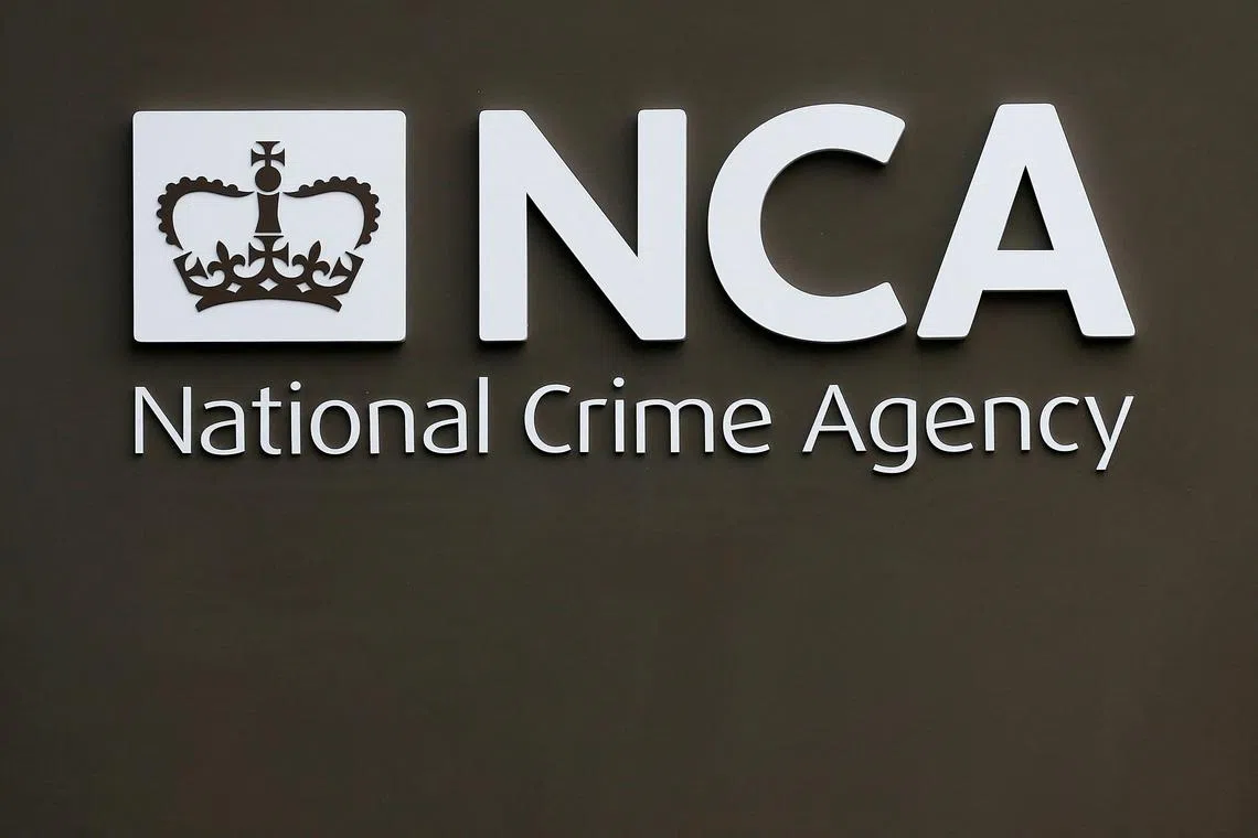 FILE PHOTO: A sign is seen outside the National Crime Agency (NCA) headquarters in London October 7, 2013. REUTERS/Stefan Wermuth/File Photo