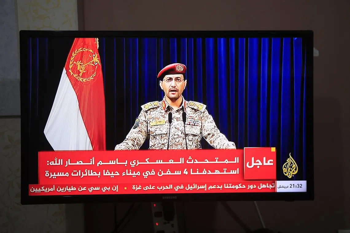 Houthi military spokesman Yahya Saree delivers a televised statement over new shipping attacks, in Sana'a, Yemen, on June 23.