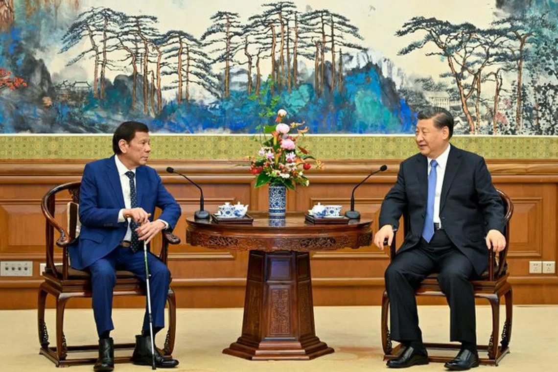 Chinese President Xi Jinping (right) met with former Philippine president Rodrigo Duterte at the Diaoyutai guest house in Beijing.