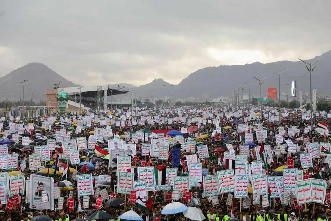 Supporters of the Houthi rally to denounce the U.S. labeling of Houthis as a 'Specially Designated Global Terrorist' group, in Sanaa, Yemen January 19, 2024. REUTERS/Khaled Abdullah/File Photo