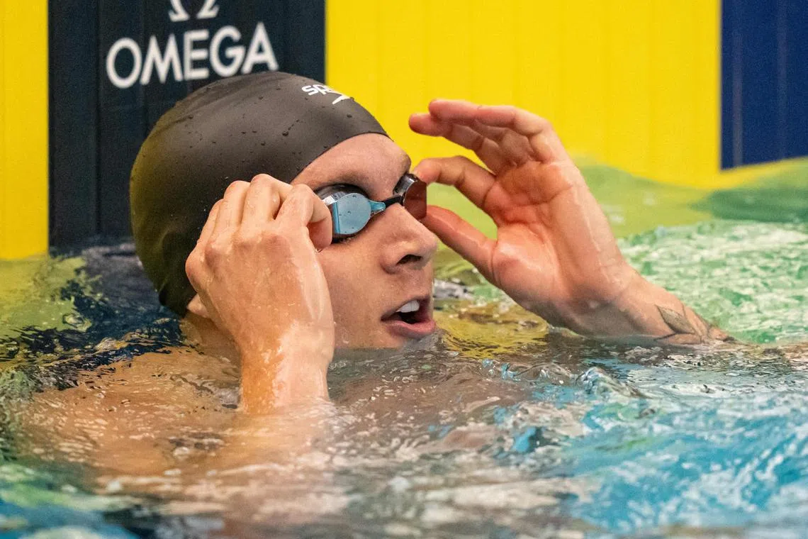 Caeleb Dressel looking on after winning the men's 100m butterfly final on day 3 of the US Open on Dec 1 at the Greensboro Aquatic Centre in Greensboro, North Carolina.
