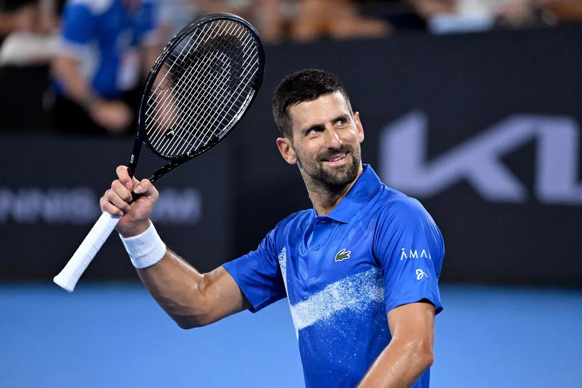 Serbia's Novak Djokovic celebrates winning his men's singles match against Australia's Rinky Hijikata at the Brisbane International.