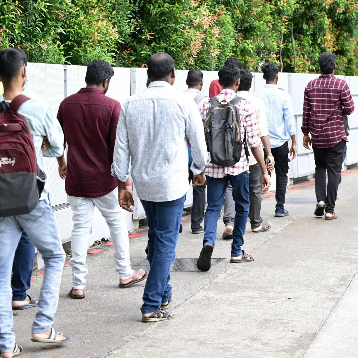 Over 100 migrant workers from KPA Engineering and SK Industries were seen entering the Ministry of Manpower in Bendemeer Road in small groups on June 22, to report unpaid wages.