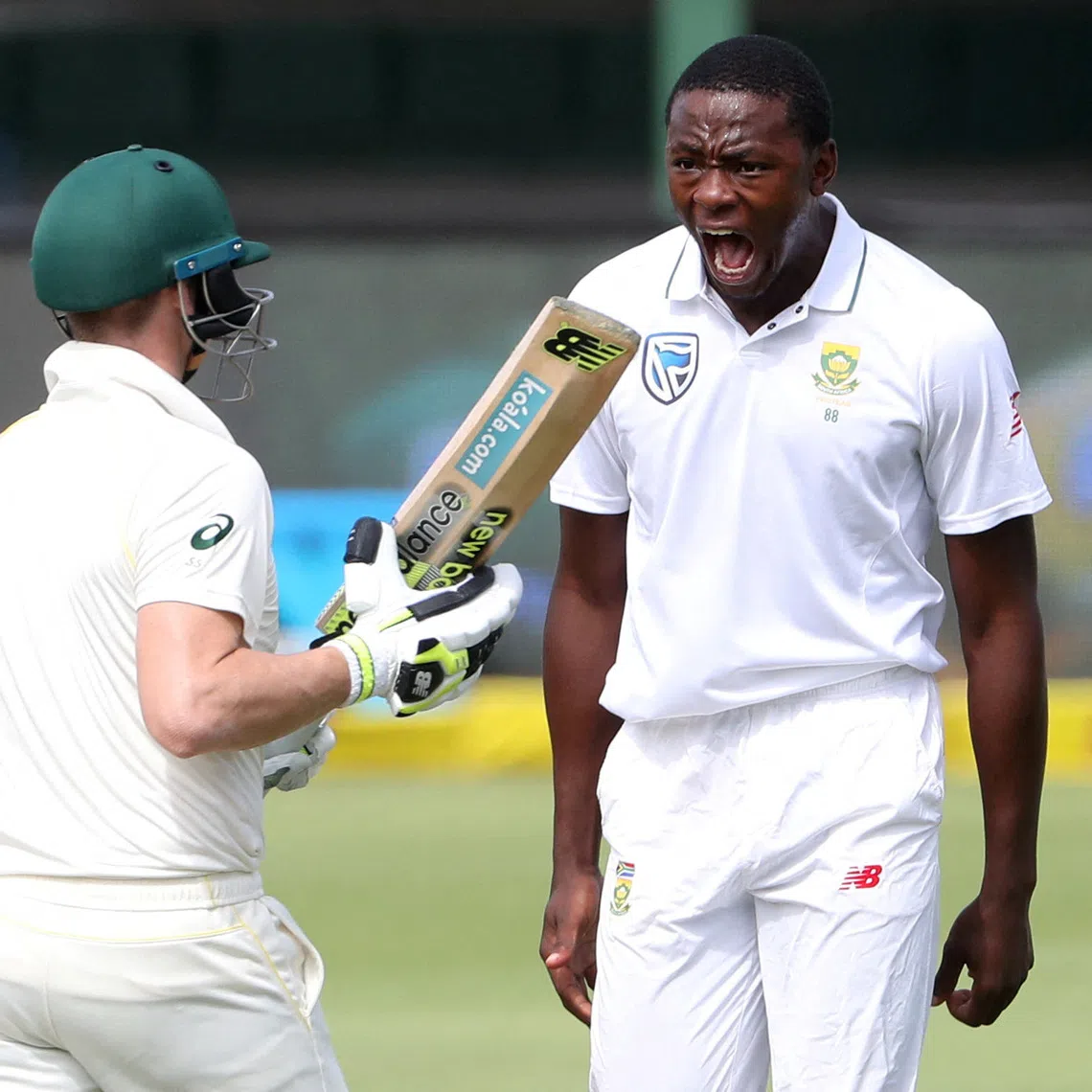 FILE PHOTO: Cricket - South Africa vs Australia - Second Test - St George's Park, Port Elizabeth, South Africa - March 9, 2018   South Africa’s Kagiso Rabada celebrates taking the wicket of Australia’s Steve Smith   REUTERS/Mike Hutchings/File Photo