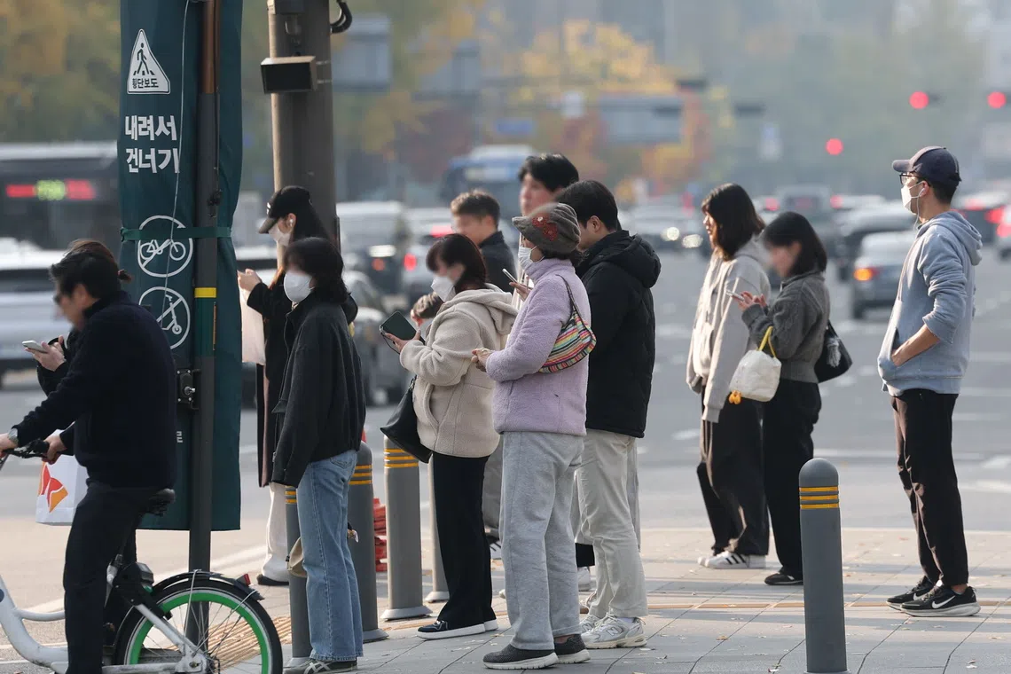 Experts say South Koreans’ love of neutral fashion reflects both cultural psychology and practicality.