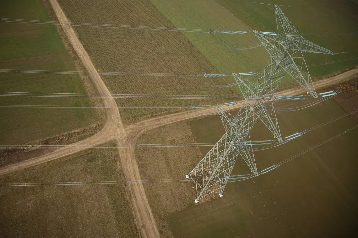 Polish transmission system operator PSE (Polskie Sieci Energetyczne) power lines are seen near Lomza, Poland, February 6, 2025. REUTERS/Kacper Pempel