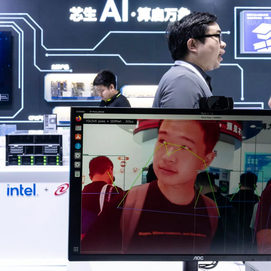 FILE Ñ A facial recognition display at an artificial intelligence conference in Shanghai, China, July 28, 2025. Chinese policymakers and the public have expressed high levels of optimism about AI, even as many in the West worry about the technologyÕs effects on employment or humanity in general. (Qilai Shen/The New York Times)