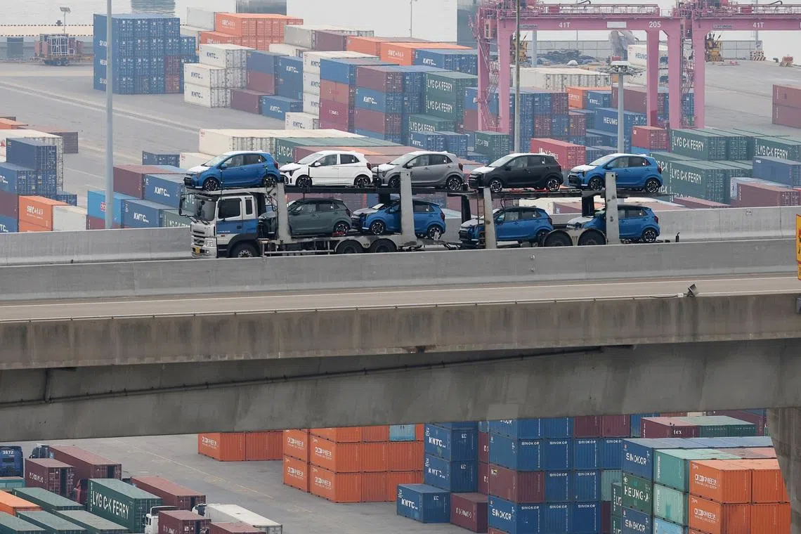 A car carrier transporting vehicles made by South Korea's automaker Kia Motors which is a sister company of South Korea’s biggest automaker company Hyundai Motors, travels near Pyeongtaek port in Pyeongtaek, South Korea, April 2, 2025.   REUTERS/Kim Hong-Ji