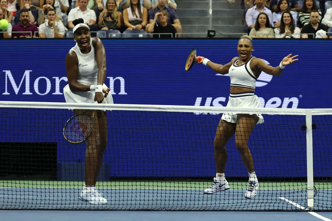 Serena Williams (right) and Venus Williams of the US in action during their first-round match against Australia’s Maya Joint and Chinese Taipei’s Chan Hao-ching.