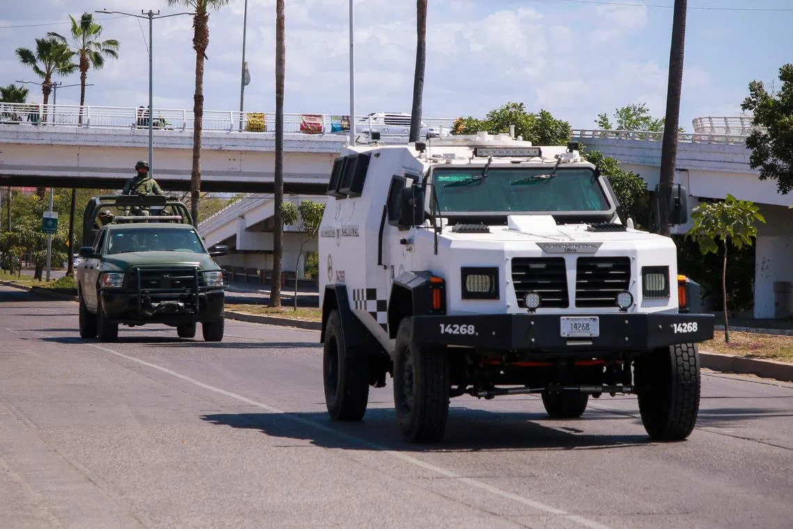 Members of the Mexican Army and National Guard patrol the streets in Sinaloa State, a cartel heartland in Mexico.