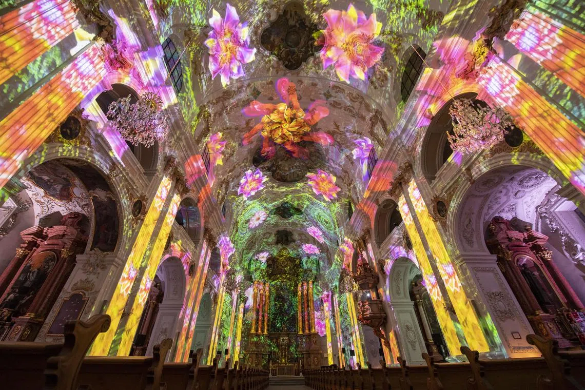 The light project 'Aeon' by Projektil from Zurich is on display inside the Jesuit Church during a media tour of the Lilu Light Festival in Lucerne, Switzerland, 11 January 2023. Around 16 light art projects will be presented at the Lucerne Light Festival from 12 to 22 January 2023.  