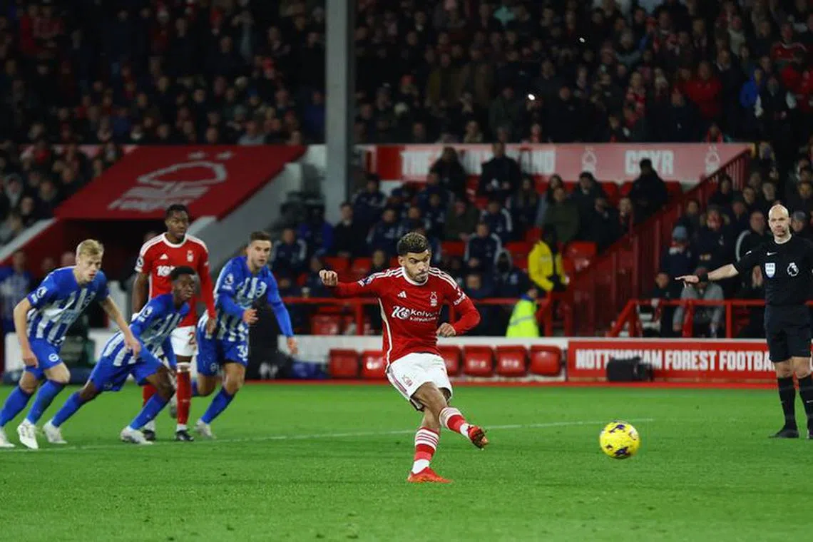 Soccer Football - Premier League - Nottingham Forest v Brighton & Hove Albion - The City Ground, Nottingham, Britain - November 25, 2023 Nottingham Forest's Morgan Gibbs-White scores their second goal from the penalty spot Action Images via Reuters/Matthew Childs