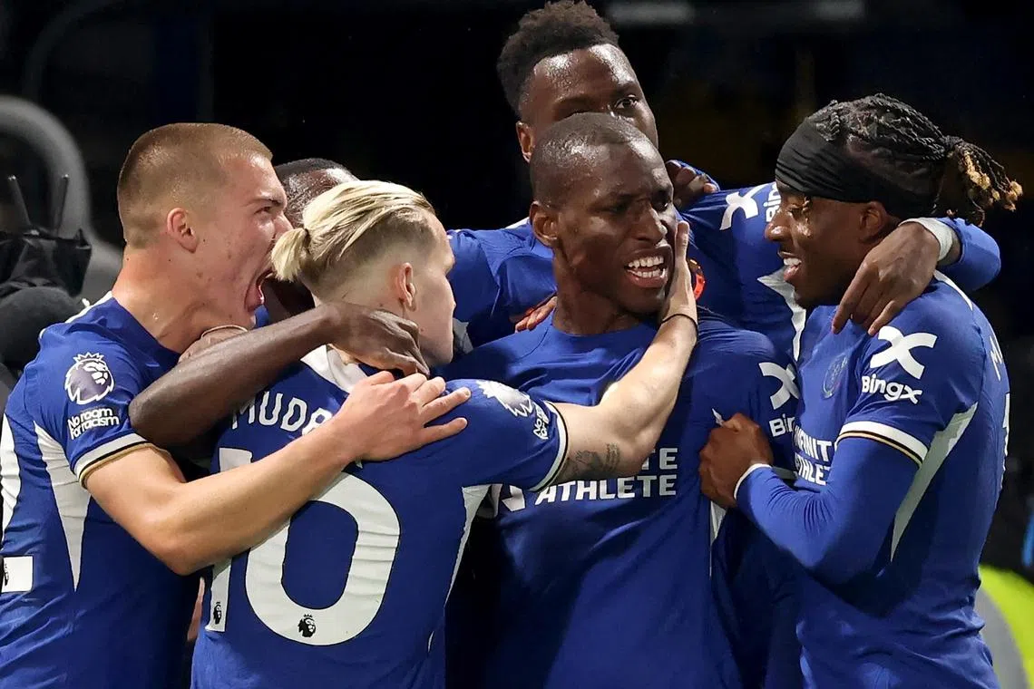 Chelsea's Nicolas Jackson (centre) celebrates with teammates after scoring his team's second goal.
