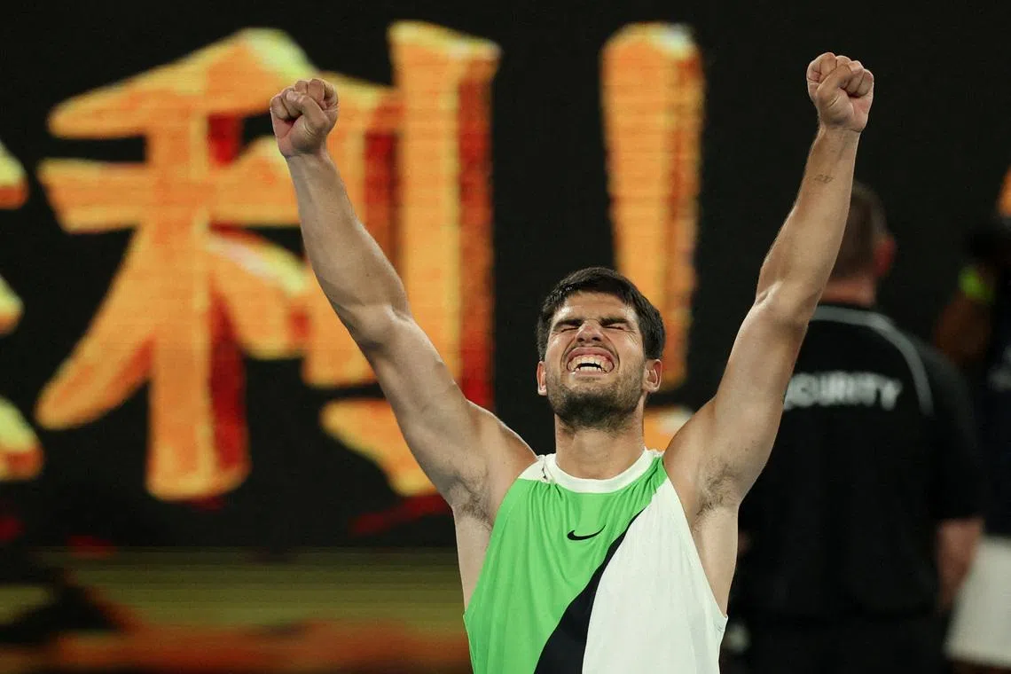 Tennis - Australian Open - Melbourne Park, Melbourne, Australia - January 27, 2026 Spain's Carlos Alcaraz celebrates winning his quarter final match against Australia's Alex De Minaur REUTERS/Edgar Su