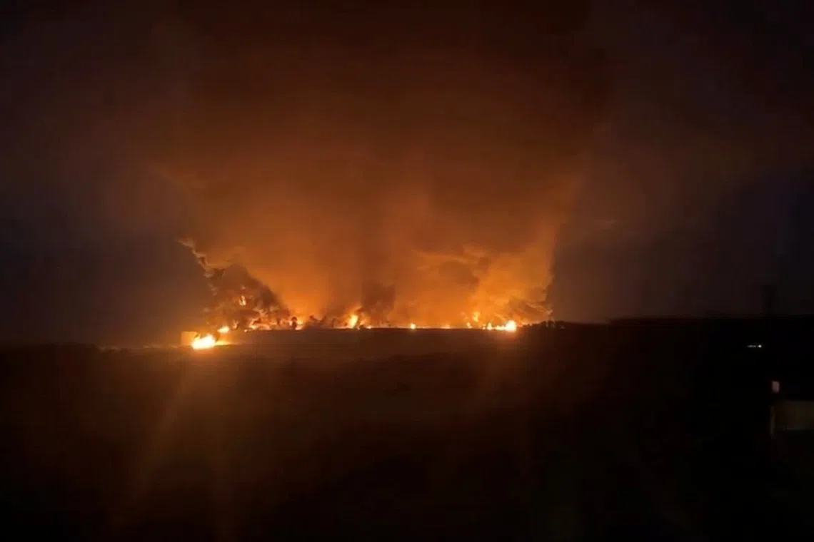 Smoke rises from fire at logistics hub of top Russian online retailer Wildberries, from what Tula regional governor Dmitry Milyayev says is after a Ukrainian drone attack, in Tula Region, Russia, August 5, 2026 in this screengrab taken from a social media video. SOCIAL MEDIA/via REUTERS