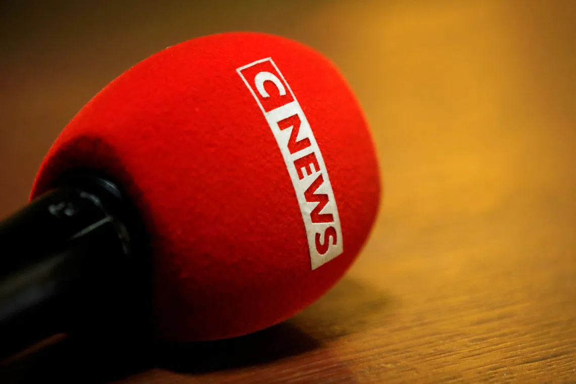 FILE PHOTO: The logo of CNEWS is seen on a microphone as journalists work at Paris courthouse, France, May 10, 2021. REUTERS/Sarah Meyssonnier/File Photo