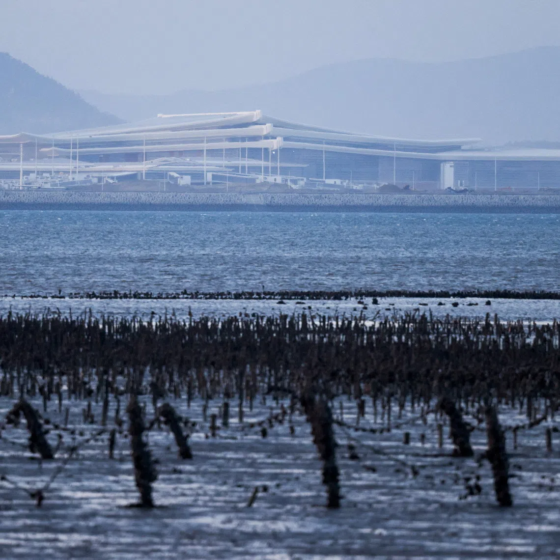 A new airport under construction in Xiamen, China as seen from Kinmen, Taiwan October 18, 2025. REUTERS/Ann Wang