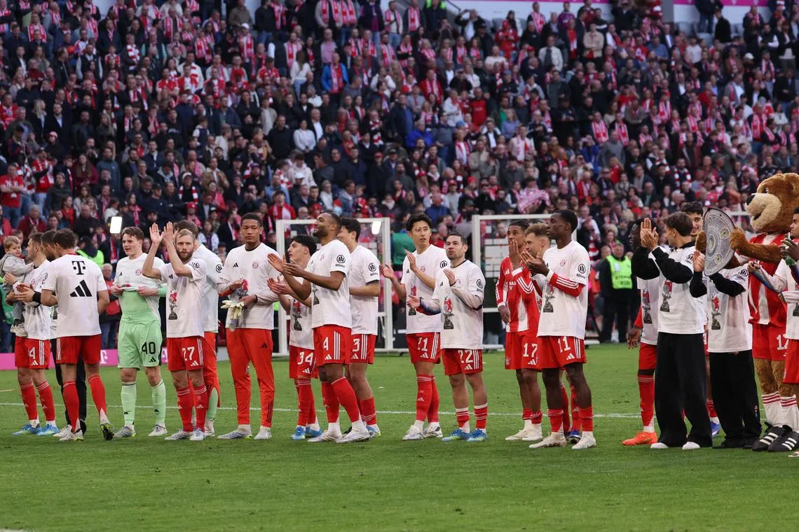 Soccer Football - Bundesliga - Bayern Munich v VfB Stuttgart - Allianz Arena, Munich, Germany - April 19, 2026 Bayern Munich players celebrate after winning the Bundesliga REUTERS/Gintare Karpaviciute