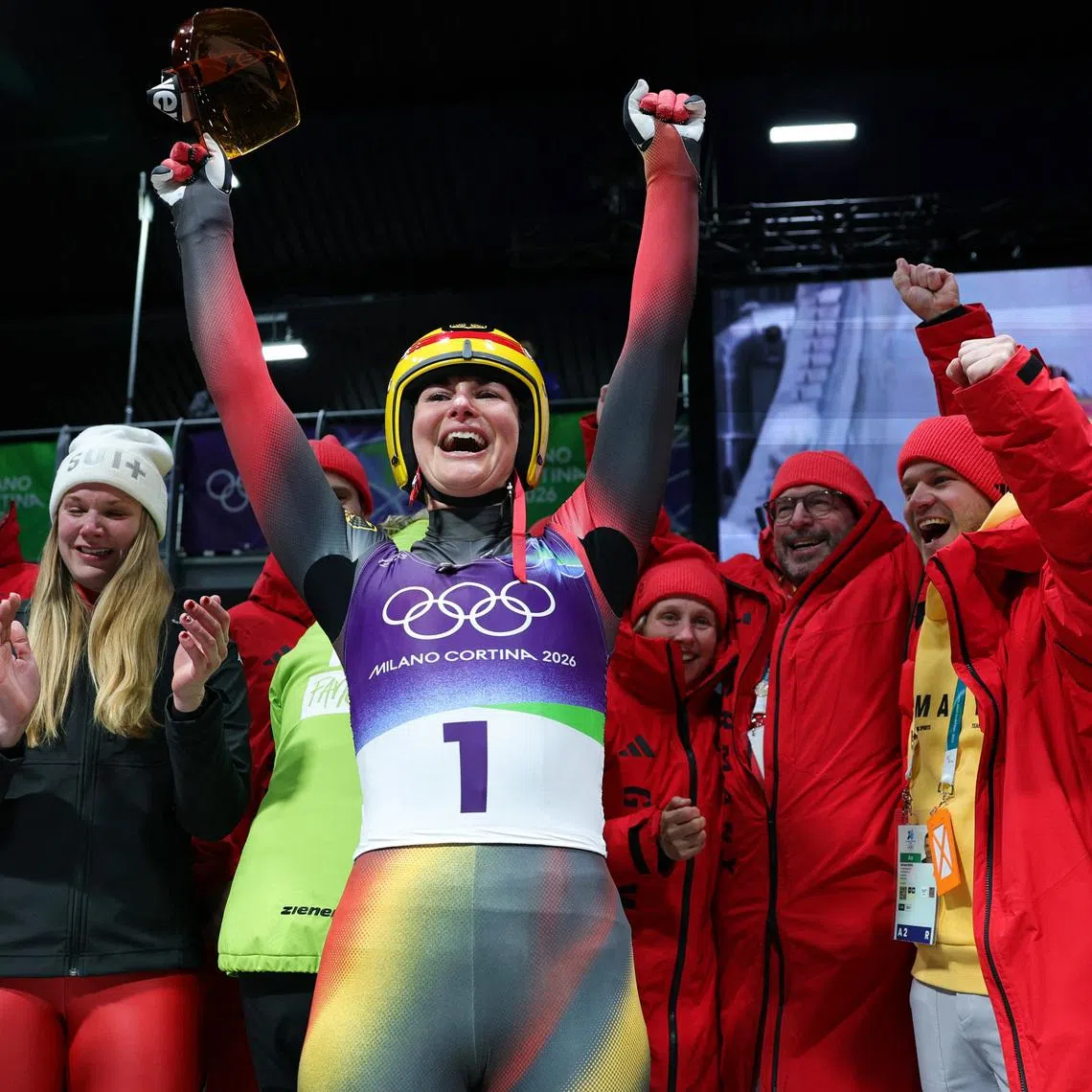 Milano Cortina 2026 Olympics - Luge - Women's Singles Run 4 - Cortina Sliding Centre, Cortina d'Ampezzo, Italy - February 10, 2026. Gold medallist Julia Taubitz of Germany celebrates after the Women's Singles REUTERS/Athit Perawongmetha