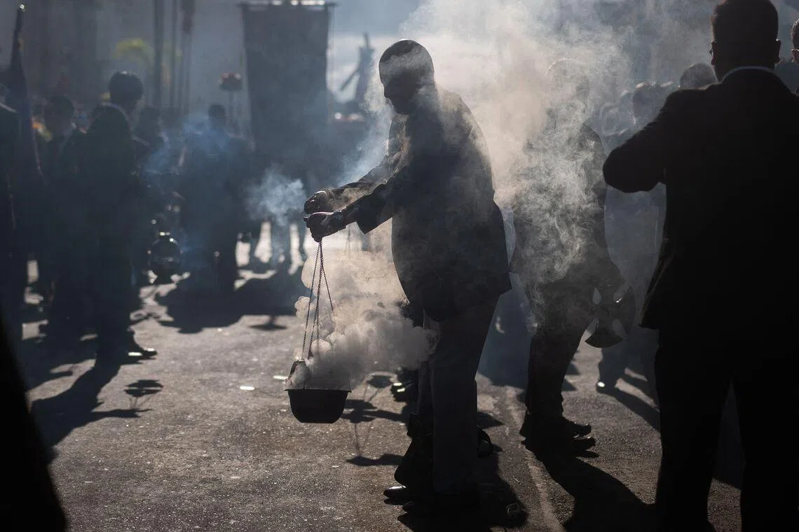A Catholic faithful taking part in the procession of La Resena during Holy Week in Guatemala City, Guatemala, on March 31, 2026. 