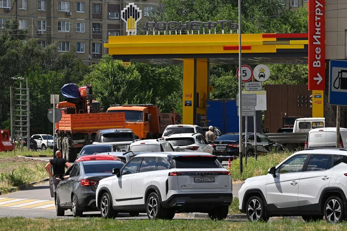 Cossacks, volunteers help keep order at petrol stations in Russian Black Sea resort