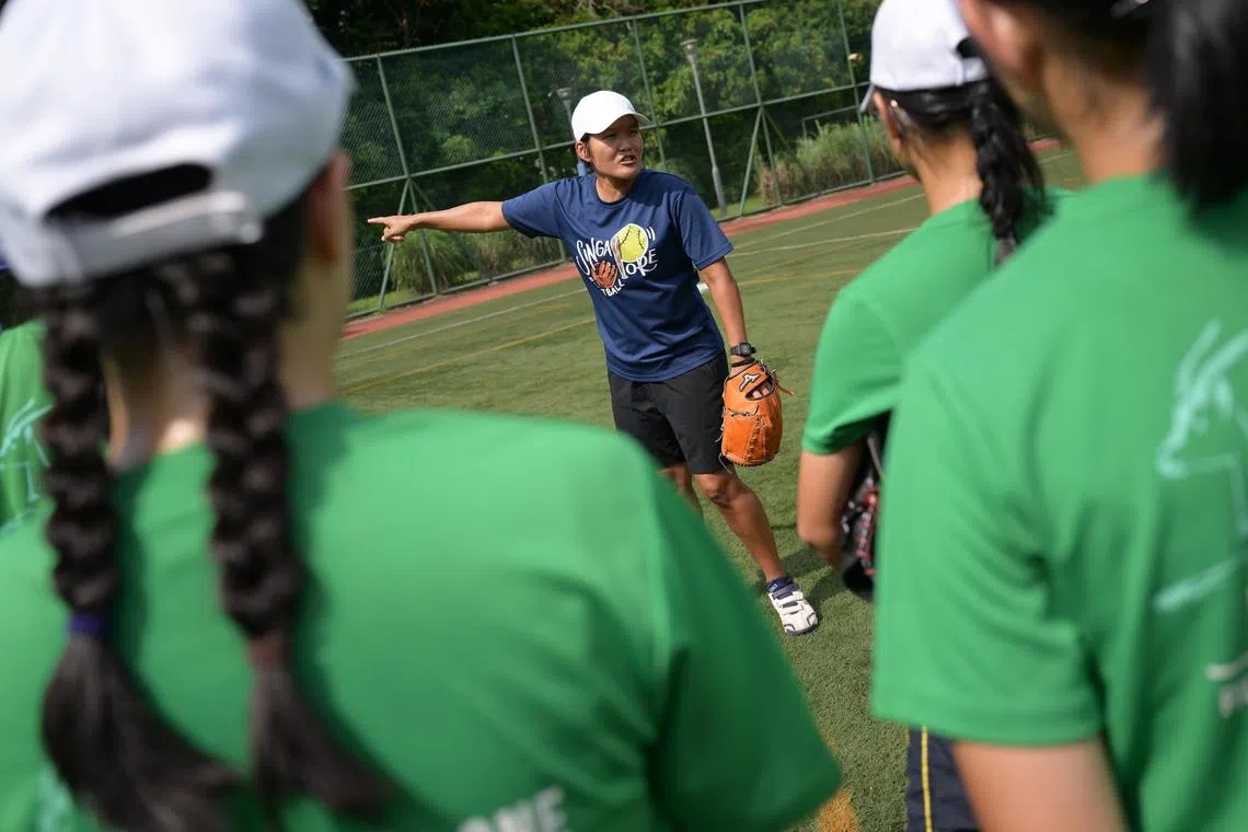 MGS softball coach Elaine Chua has spent 19 years with the school, winning multiple titles.