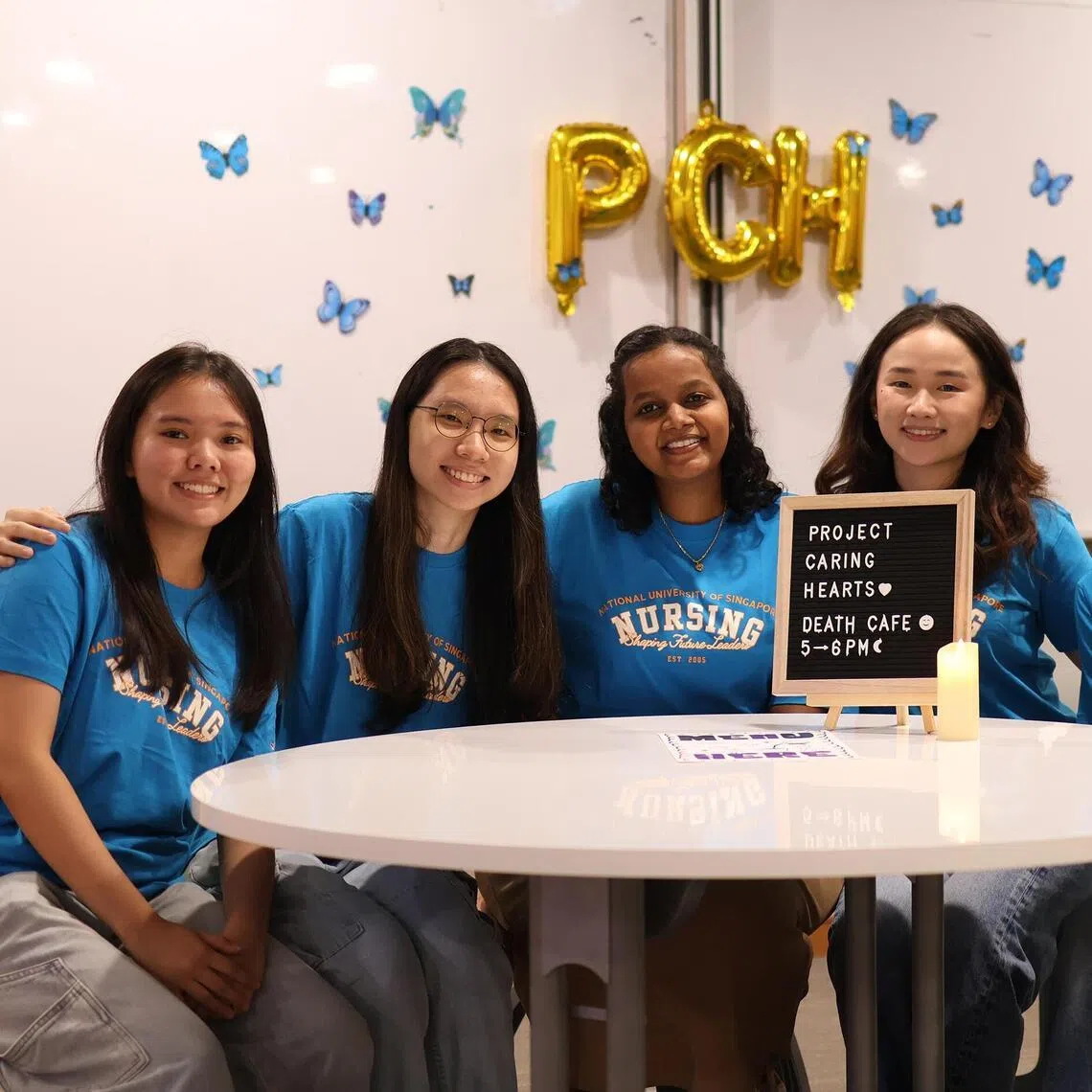 Shantini Subramaniam (centre of picture, in blue) at a recent Death Cafe event as part of Project Caring Hearts.