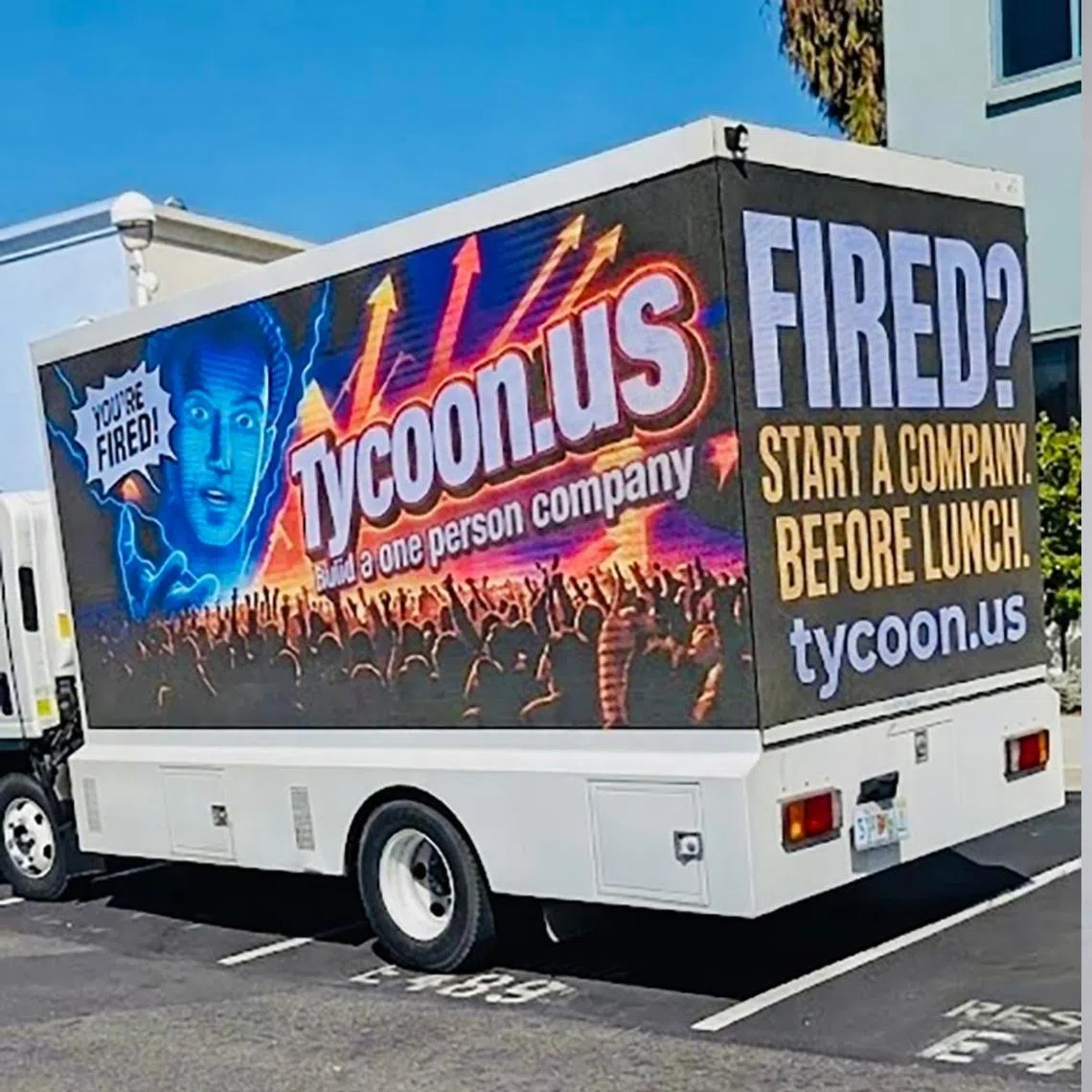 Qu Xiaoyin, the founder of a startup that provides a suite of AI employees for one person firms, rented an LED truck and drove inside Meta’s headquarters at Menlo Park, California, on May 20, as the company began laying off 8,000 employees. The truck’s screens flashed a blunt message at departing employees: “Fired? Start a company before lunch.”