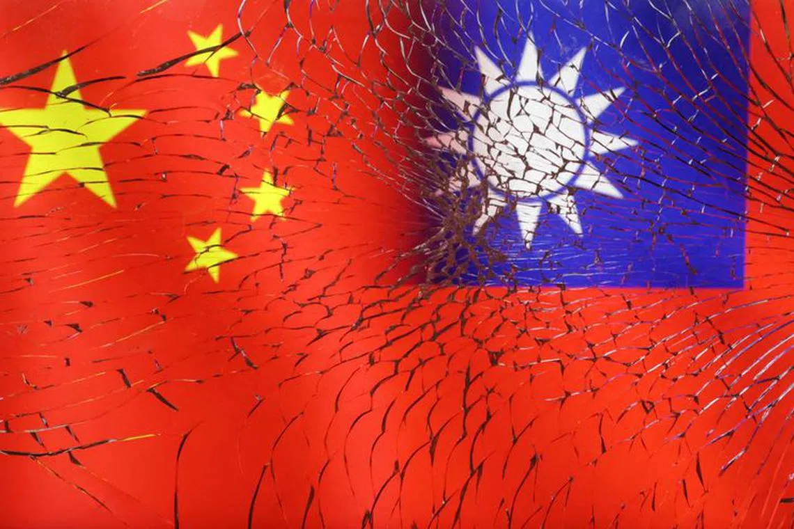 Chinese and Taiwanese flags are seen through broken glass in this illustration taken, April 11, 2023. REUTERS/Dado Ruvic/Illustration