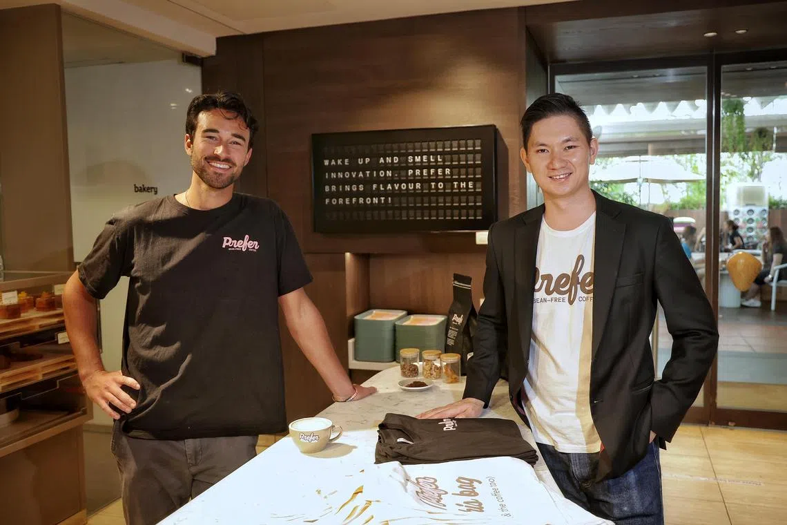 Prefer co-founders Jake Berber (left) and Tan Ding Jie (right) at the launch of their startup Prefer, an alternative bean-free coffee made from upcycled soya bean pulp, old bread and spent grains.