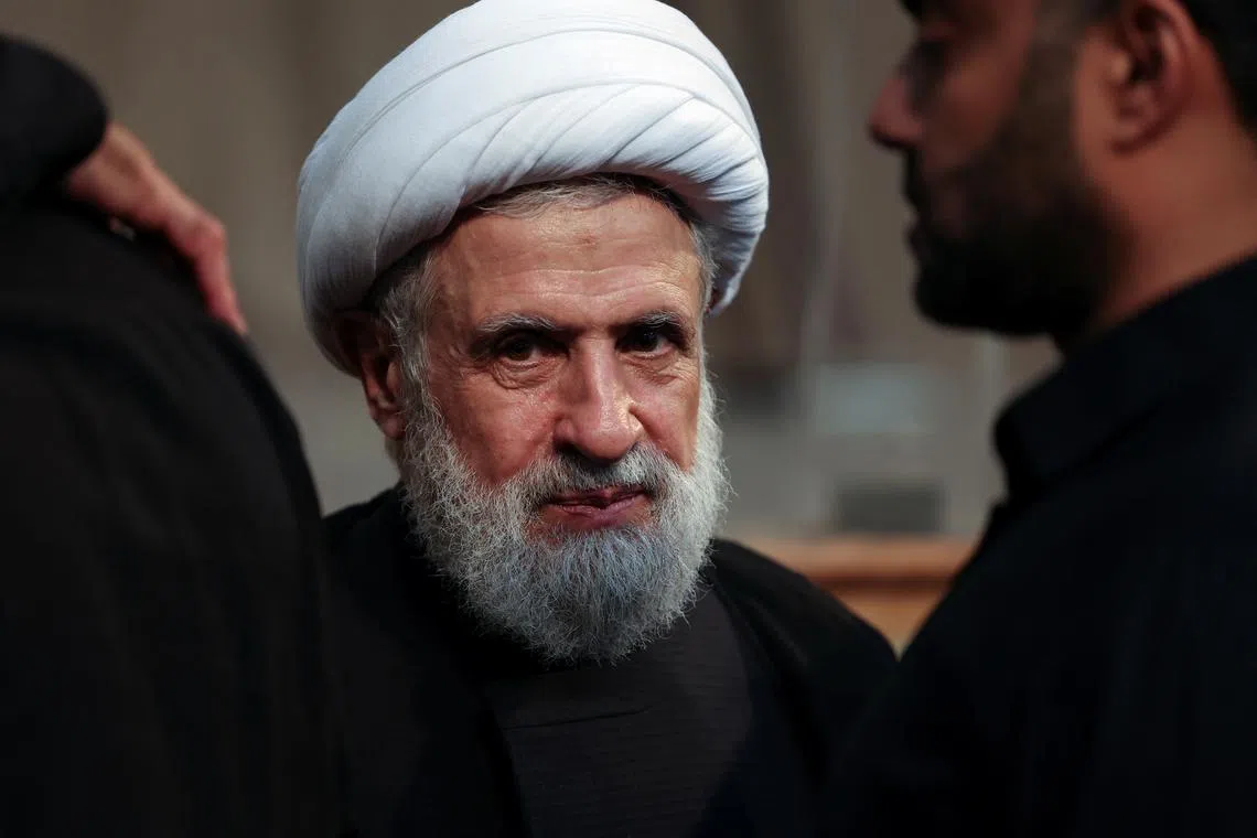 FILE PHOTO: Lebanon's Hezbollah deputy leader Sheikh Naim Qassem accepts condolences for the death of Hezbollah senior commander Fuad Shukr, who was killed on Tuesday in an Israeli strike, in Beirut's southern suburbs, Lebanon August 2, 2024. REUTERS/Mohamed Azakir/File Photo