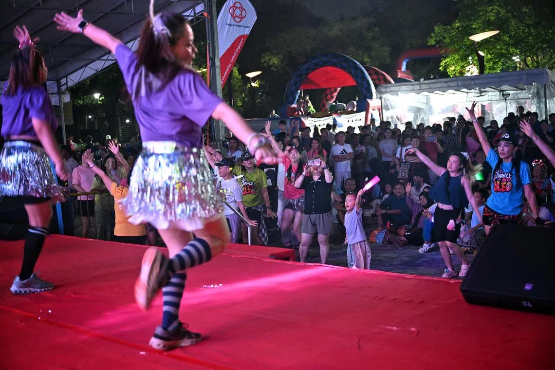 New Year revelers at the Woodlands Waterfront Countdown 2026 on Dec 31, 2025. 