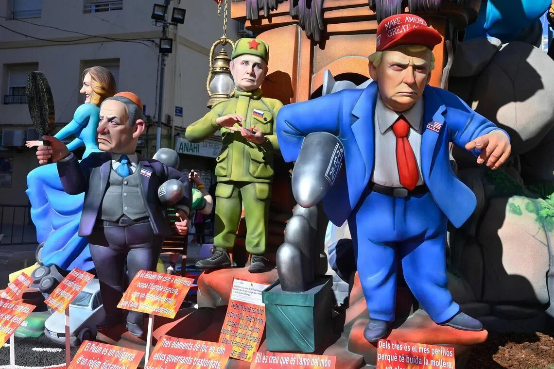 Sculptures depicting US President Donald Trump, Russian President Vladimir Putin and Israeli Prime Minister Benjamin Netanyahu at a festival in Spain on March 16. 