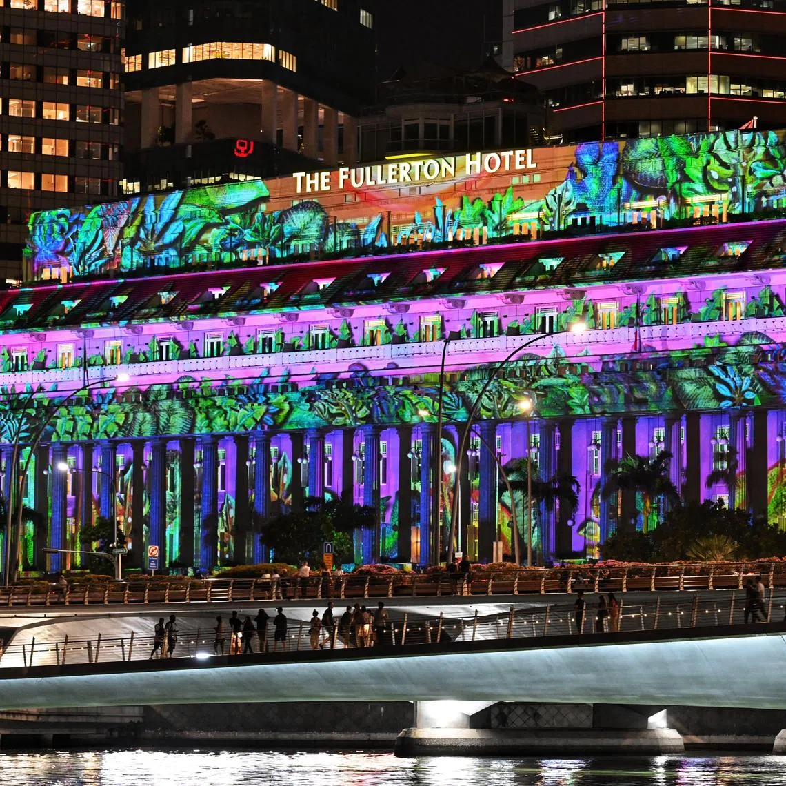 Media preview of Brightening Lives, a light projection show at The Fullerton Hotel Singapore on Dec 19, 2024. 

It is part of the programme for this year?s Marina Bay Singapore Countdown (MBSC) 2025. The projections  feature three original artworks by artists from ART:DIS, a non-profit organisation that empowers artists with disabilities. With the theme ?Thriving?, the projections on the facade of The Fullerton Hotel Singapore hope to encourage the community to reflect on what it means to thrive in Singapore, and collectively tell a story of tenacity, resilience and progress.