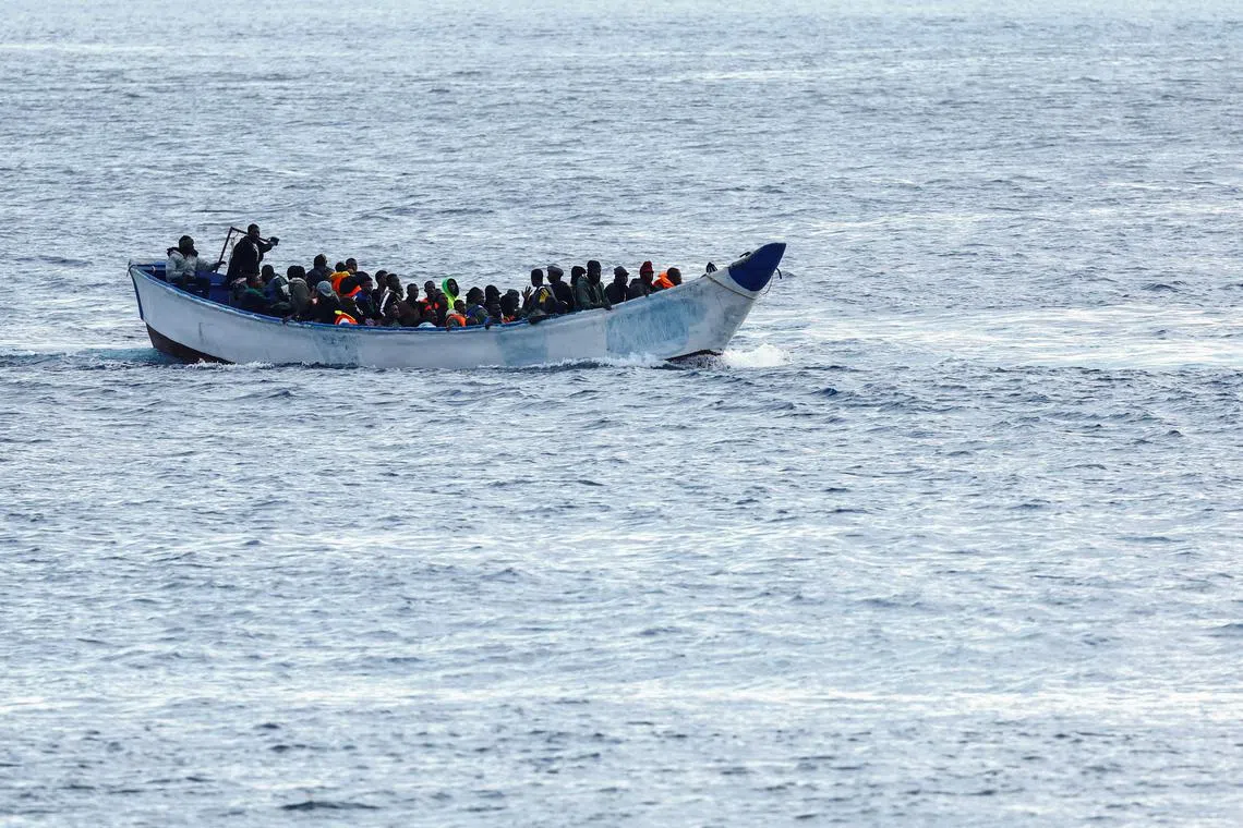 FILE PHOTO: A fibreglass boat with migrants is seen arriving at the port of La Restinga on the island of El Hierro. Spain, November 25, 2024. REUTERS/Borja Suarez/File Photo