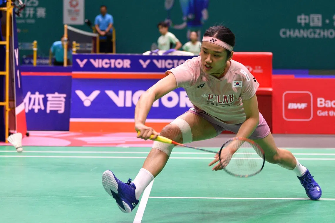 South Korea’s An Se-young hits a return to Canada’s Michelle in their women’s singles match at the China Open badminton tournament in Changzhou, in China’s eastern Jiangsu province on July 23, 2025.