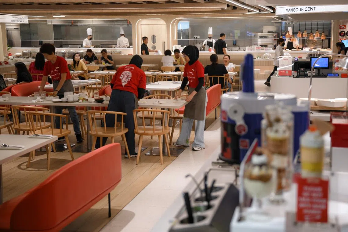 About 15,000 full-time food services workers will have their monthly salaries raised to at least $2,220, said the Ministry of Manpower.