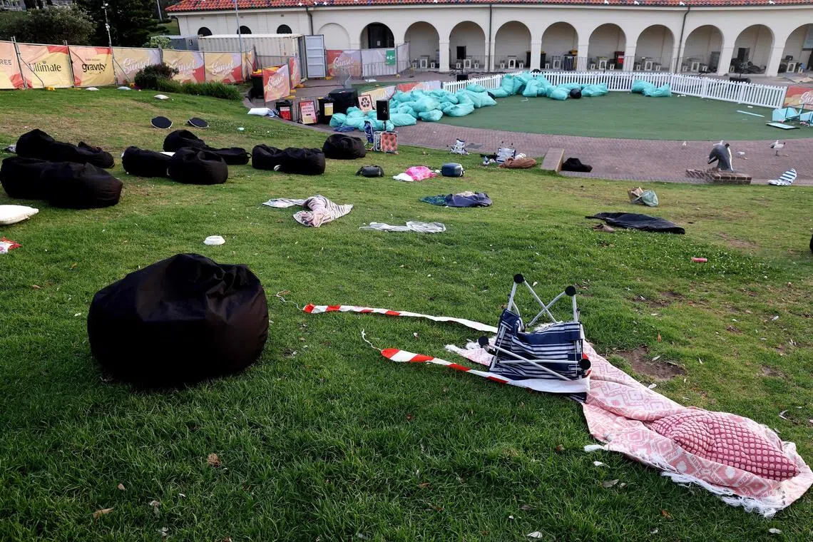 Belongings of members of the Jewish community are seen at the scene of a shooting at Bondi Beach in Sydney on Dec 15, 2025.