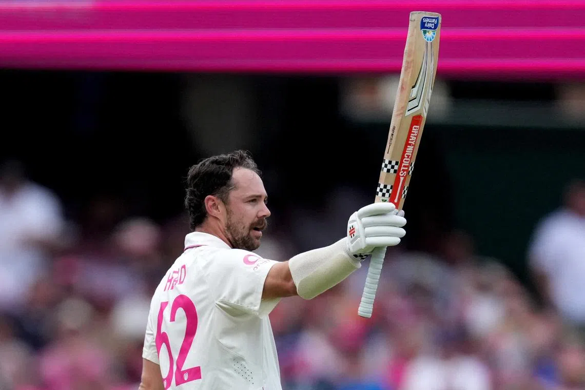 Cricket - The Ashes - Australia v England - Fifth Test - Sydney Cricket Ground, Sydney, Australia - January 6, 2026 Australia's Travis Head celebrates after completing his century REUTERS/Asanka Brendon Ratnayake