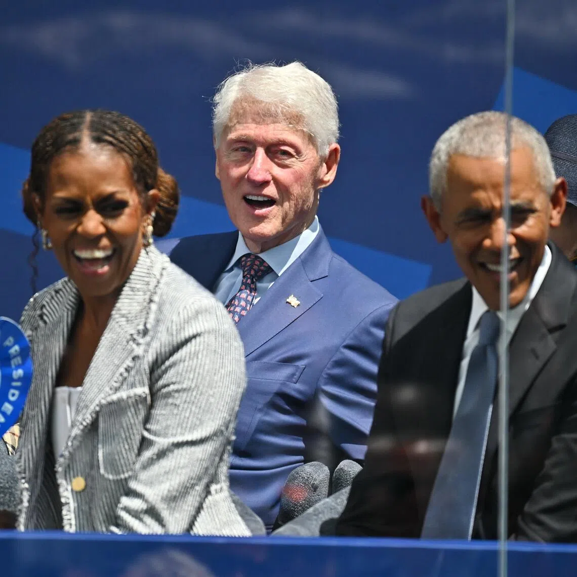 Former First Lady Michelle Obama sits alongside former US Presidents Bill Clinton and Barack Obama during the opening ceremony of the Obama Presidential Center in Chicago on June 18. 