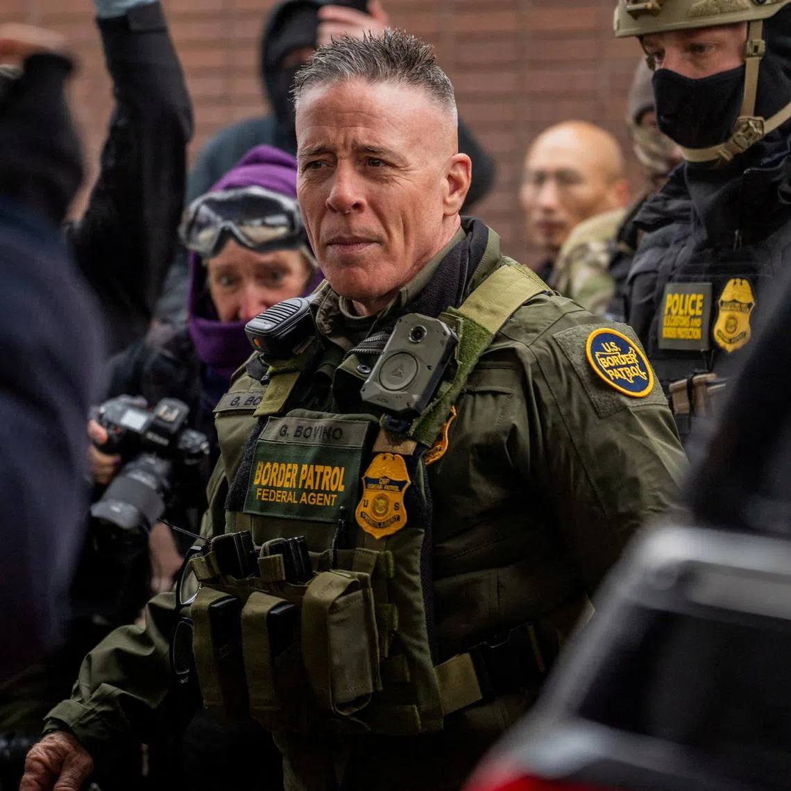 FILE PHOTO: U.S. Border Patrol Chief Gregory Bovino outside a Speedway gas station after his convoy stopped there, where protesters and community observers gathered, in Minneapolis, Minnesota, U.S., January 21, 2026. REUTERS/Madison Swart/File Photo