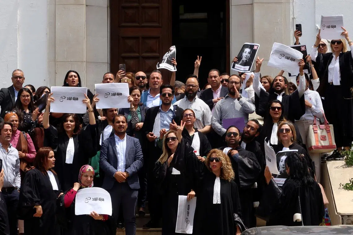 FILE PHOTO: Lawyers carry banners during a protest against the arrest of Sonia Dahmani, a prominent lawyer critical of the president, outside the Palace of Justice building in Tunis, Tunisia May 13, 2024. REUTERS/Jihed Abidellaoui/File Photo