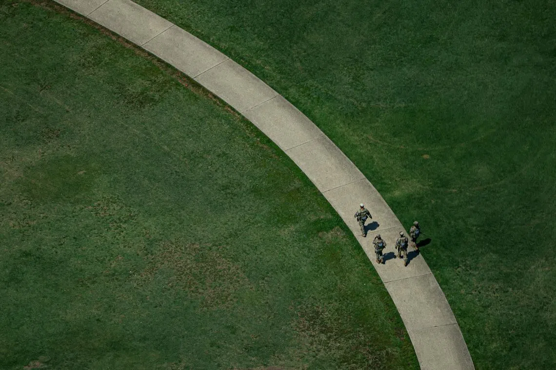 Members of the National Guard patrol near the Washington Monument, Washington, DC, US, on June 11, 2026. 