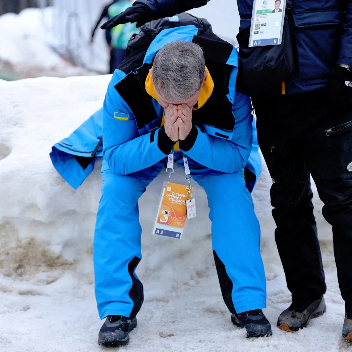 Mykhailo Heraskevych, father and coach of Vladyslav Heraskevych of Ukraine reacts after he gets disqualified for wearing a helmet in tribute to athletes who have died amid Russia's attack on Ukraine after a scheduled meeting with IOC President Kirsty Coventry REUTERS/Athit Perawongmetha