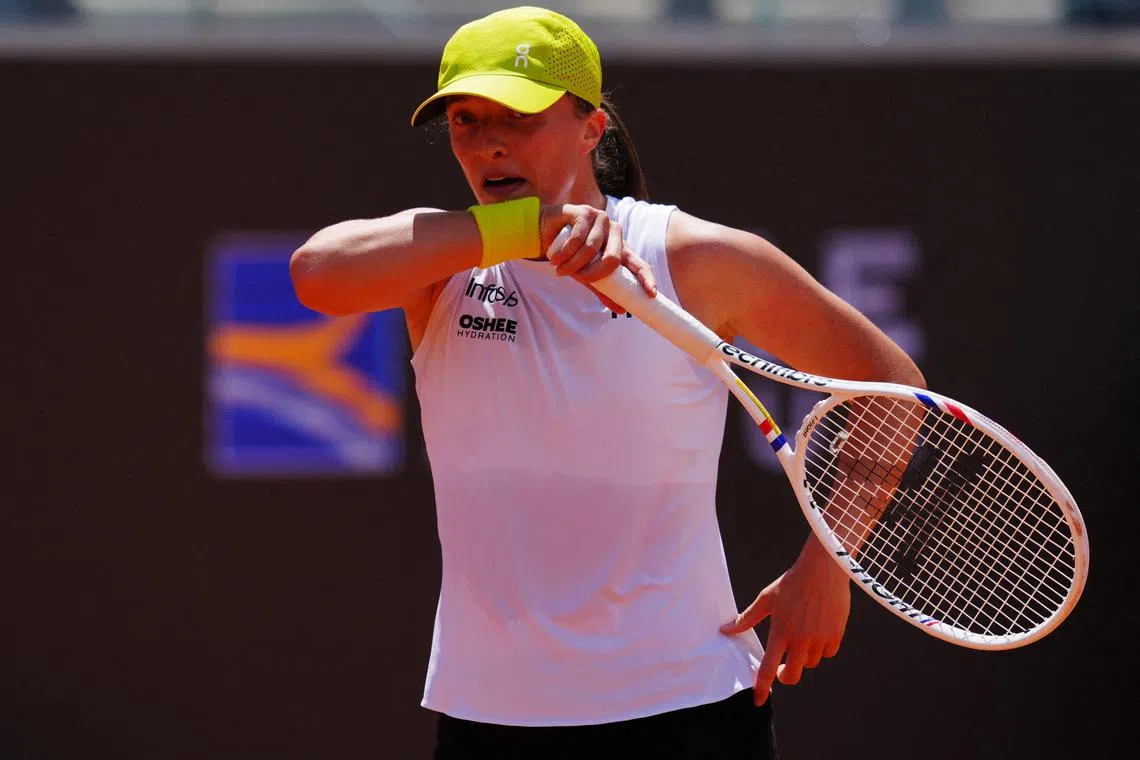 FILE PHOTO: Tennis - Italian Open - Foro Italico, Rome, Italy - May 8, 2025 Poland's Iga Swiatek reacts during her round of 64 match against Italy's Elisabetta Cocciaretto REUTERS/Aleksandra Szmigiel/File Photo