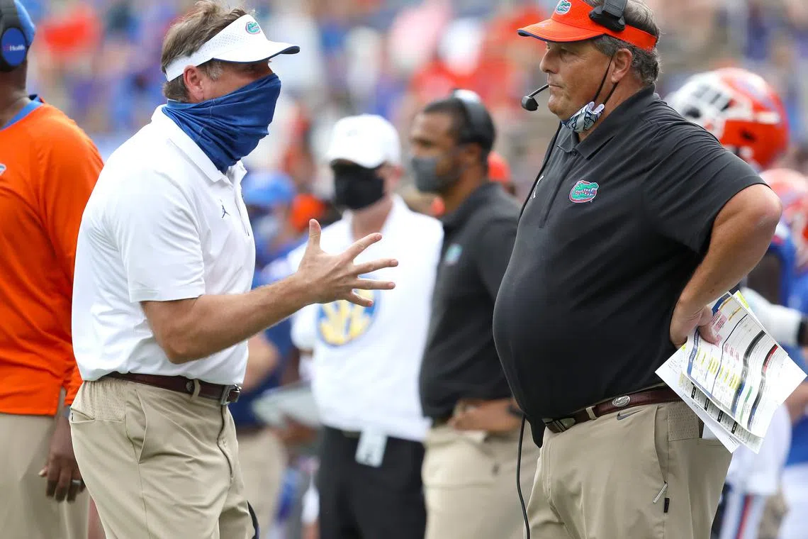 Nov 28, 2020; Gainesville, FL, USA;  Florida Gators head coach Dan Mullen yells at defensive coordinator Todd Grantham during a football game against the Kentucky Wildcats at Ben Hill Griffin Stadium in Gainesville, Fla. Nov. 28, 2020.  Mandatory Credit: Brad McClenny-USA TODAY NETWORK/File Photo