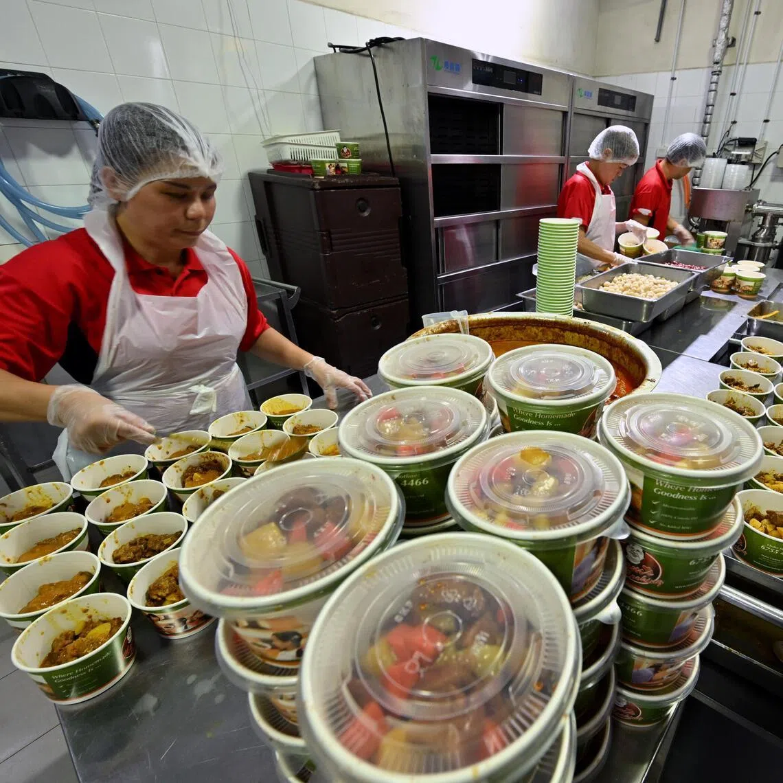 The central kitchen of Mom’s Cooking, a Woodlands-based company that has been delivering meals since 2008.